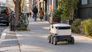 Autonomous delivery robot operating on an urban sidewalk